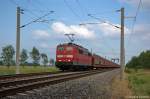 151 023-9 DB Schenker Rail Deutschland AG mit einem Opel Astra Autotransportzug bei Nennhausen und fuhr in Richtung weiter.