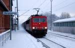 155 141 zieht einen Kesselwagenzug am 07.01.09 durch Burgkemnitz in Richtung Berlin.