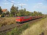 155 031-8 mit einem Zug offener Gterwagen in Magdeburg Diesdorf.