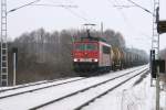 155 004-5 ist mit Kesselwagen am 19.02.2010 bei Serwest in Richtung Berlin unterwegs