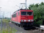 155 052-4 verlsst den Bhf Stralsund - Rgendamm.