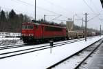 155 084 mit einem leeren Autozug am Haken am 23.01.2011 in Reichenbach(Vogtl.).