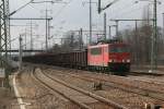 155 030 mit einen Kohlezug am Haken am 11.03.2011 in Berlin Schnefeld.