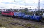 Eichwaggons der Firma Wolfgang Fricke aus Lutherstadt Wittenberg in Gterzug von Mannheim nach Engelsdorf gezogen von Railion DB Logistics 155 114-2, fotografiert in Halle ( Saale ) am 03.10.2012
