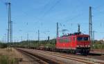 155 245-4 hat am 29.09.13 einen Containerleerpark am Haken und bringt diesen durch Buchholz Richtung Hamburg.