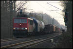 Es ist 17.19 Uhr am 13.3.2007 als 155036 mit einem Güterzug durch den ehemaligen Bahnhof Sudmühle bei Münster in Richtung Osnabrück unterwegs ist.