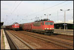 DB 155137-3 kommt hier am 1.6.2007 mit einem Coilzug in Richtung Süden fahrend durch den Bahnhof Berlin Schönefeld.