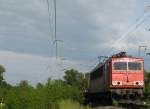 155 187-8 im Glitzerlicht der Abendsonne am 20.05.2008 kurz vor der Fahrt ber die Magdeburger Elbbrcke.