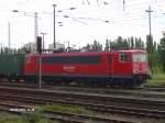 155 201 steht abgebgelt mit ein Containerzug in Eisenhttenstadt.03.08.07
