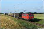 155 063 aus Richtung Stralsund nach Rostock Seehafen am 01.07.09 in Mnchhagen.