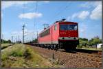 155 007-8 vor einem (entladenen)Rhrenzug aus Mukran.    Stralsund am 16.06.09 