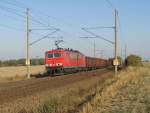 155 073-0 mit einem Ganzzug offener Gterwagen zwischen Magdeburg und Niederndodeleben. Die Fahrt ging Richtung Braunschweig, fotografiert am 27.09.2009. 