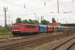 Mit einem Ganzzug polnischer Kohlewagen fhrt 155 004-5 durch den Rangierbahnhof Magdeburg-Rothensee in Richtung Stendal.