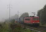 155 121-7 mit einem  LKW-Walther  Transport kommt hier an Diedersdorf vorbei, in Richtung Schnefeld fahrend. 11.10.2010