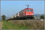 Mit etlichen Kesselwagen am Haken ist 155 066 am 16.10.2007 bei Ltzelsachsen unterwegs.