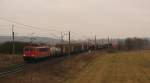 155 077-1 mit 62210 Richtung Genshagener Heide und dem Blick bis zur Kirche Saarmunds durch die Kurve.