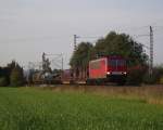155 234-8 ist am 4. Oktober 2011 mit einem gemischten Gterzug bei Kronach unterwegs. 