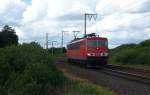 155 013-6 fuhr am 01.06.2012 als Lokzug von Emden nach Drpen vorbei, hier bei Veenhusen.