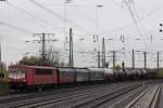 155 214 am 21.4.12 mit einem gemischten Gterzug bei der Durchfahrt durch Hamm (Westf.) Hbf.