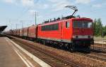 Hier 155 178-7 mit einem Gterzug, bei der Durchfahrt am 7.7.2013 durch Berlin Schnefeld Flughafen, in Richtung Berlin Grnauer Kreuz.