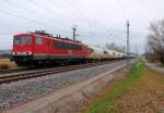 Die 701 der MEG mit Kalksilowagen bei der Durchfahrt in Nassenheide am 23.11.2013.