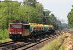 10.6.2014 Röntgental. 155 048 mit russischem Kesselzug mit Breitspur- und Kuppelwagen nach Mukran. Zu DR Zeiten mit Lademaßüberschreitung Berta. Standort: Standort: N 52.6481° E 13.5125° 