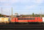 155 123-3 DB fährt  mit einem langen Kesselzug aus Antwerpen-Kanaaldok(B) nach Millingen(D) und fährt als Umleiter über Köln  bei der Ausfahrt aus Aachen-West und fährt in Richtung Aachen-Schanz,Aachen-Hbf,Köln.
Aufgenommen vom Bahnsteig in Aachen-West bei schönem Sonnenschein am Abend vom 1.10.2014.