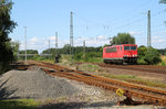 155 010 fährt Lz am Übergabebahnhof zum K+S-Werk in Sehnde vorbei.