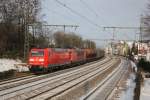 185 200-3 zog 155 016-9 und einen gemischten Güterzug, aufgenommen am 19.01.2013 kurz hinter Bielefeld.