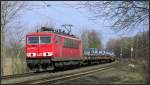 Die 155 086-2 ist mit einen offenen Coilzug nach Aachen West unterwegs.Hier zu sehen im Gleisbogen bei Rimburg auf der Kbs 485 am 13.März 2015.