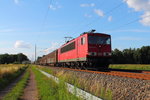 Die 155 0379-5 mit einem gemischten Güterzug bei der Durchfahrt am 28.06.2016 in Nassenheide.