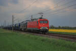 EBS 156 002 & 232 592 mit einem leeren Getreidezug aus Vierow kommend, hier zu sehen in Groß Kiesow (10.05.2022).
