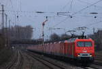 Am 01.02.2021 zogen MEG 156 003 und 143 851 einen langen Schrottzug mit 21 143eern und 3 112ern im schlepp und MEG 203 152 kalt am Zugschluß nach Opladen-Mitte durch Düsseldorf-Rath.