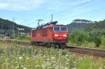 180 015 in Verkersroter Farbgebung ist LZ im Elbtal Richtung Bad Schandau unterwegs.Aufgenommen bei Knigstein(Sachsen)am 19.7.2011