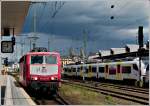 - Bahnhofsambiente - Der weie Latz der 181 213-0 bildet am 23.06.2011 einen schnen Kontrast zum bedrohlichen Himmel im Hauptbahnhof von Koblenz.