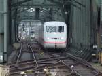 Ein ICE2  Bergen auf Rgen  als ICE 650 aus B-Ostbahnhof fhrt ber die Hohenzollernbrcke in den Klner Hbf ein.