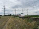 Ein ICE519 von Dortmund Hbf nach Mnchen Hbf mit +10.Am 13.07.08 bei der durchfahrt in Lampertheim.