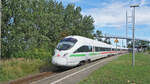 Der ICE1711 Ostseebad Binz - München Hbf bei der Durchfahrt durch den Bahnhof Stralsund-Rügendamm.