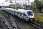 411 028-4 als Leerfahrt von Rostock Hbf nach Warnemnde bei der Durchfahrt in Rostock-Bramow,spter ging es als ICE 1611 zurck nach Mnchen.08.09.2012