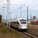 411 082-1 Mainz als ICE 1704 von Leipzig Hbf nach Warnemnde bei der Einfahrt im Rostocker Hbf.im Hintergrund der Wasserturm.19.10.2013