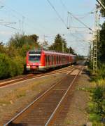 Einfahrt des 422 002-6 mit einer S8 in Kleinenbroich.