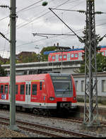 Verknüpfung der Linien der S-Bahn Stuttgart im Bahnhof Stuttgart-Zuffenhausen auf zwei unterschiedlichen Ebenen:  Während 423 343-3 mit einem Schwestertriebzug als S4 von Backnang nach