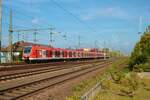 DB Regio S-Bahn Rhein Main ET 423 832-5 und 423 xxx als S4 in Langen (Hessen) am 05.10.22