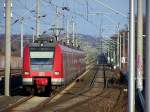 423 198/698 und 423 046/546 aus Au(Sieg) kommend fahren am 31.01.09 bei herzlichem Sonnigen Wetter in Sindorf ein.