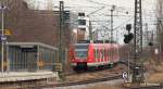 423 647-7 als S7 nach Aying bei der Einfahrt in den Bahnhof Heimeranplatz am 20.03.10.