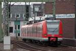 423 257-5 als S13 aus Troisdorf nach Kln Hansaring bei der Ausfahrt in Kln Hbf, 23.7.10