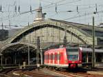 423 254-2 am 27.10.2011 als S13 bei der Ausfahrt aus dem Klner Hbf Richtung Hohenzollernbrcke.