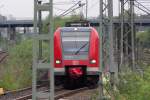 Eingeklemmt? 423 248 verlsst als S11 den Tunnel am Kieshecker Weg (Sdportal) und fhrt auf dem Weg nach Bergisch-Gladbach in den Bahnhof Dsseldorf-Unterrath ein.