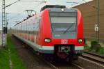 423 794 mit einer S11 bei der Anfahrt an den Bahnsteig in Allerheiligen am 6.4.2014 
