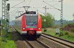 423 698 auf der Kbs 495 als S11 nach Düsseldorf Flughafen unterwegs bei Allerheiligen.